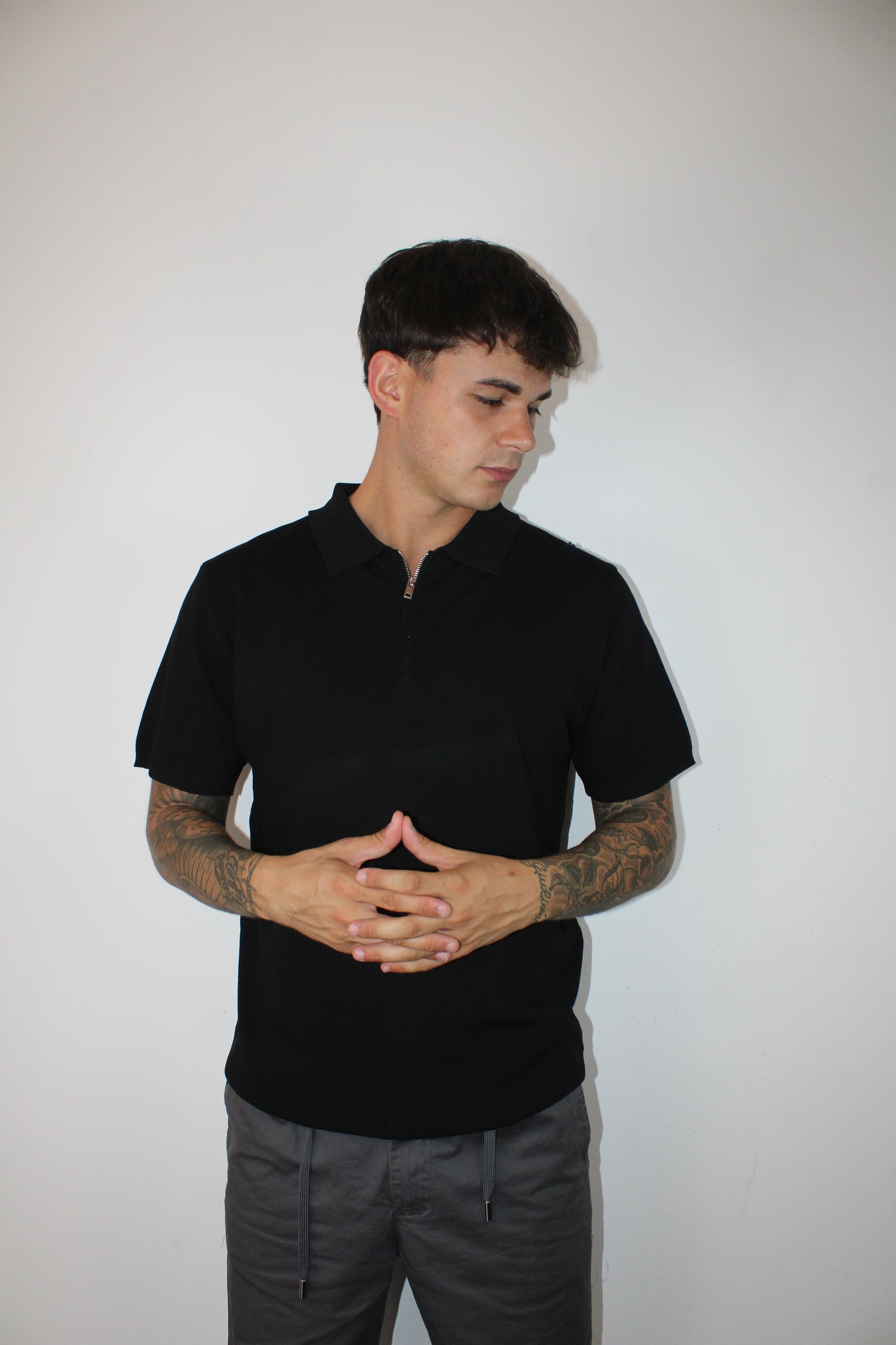 Polo a maniche corte con zip