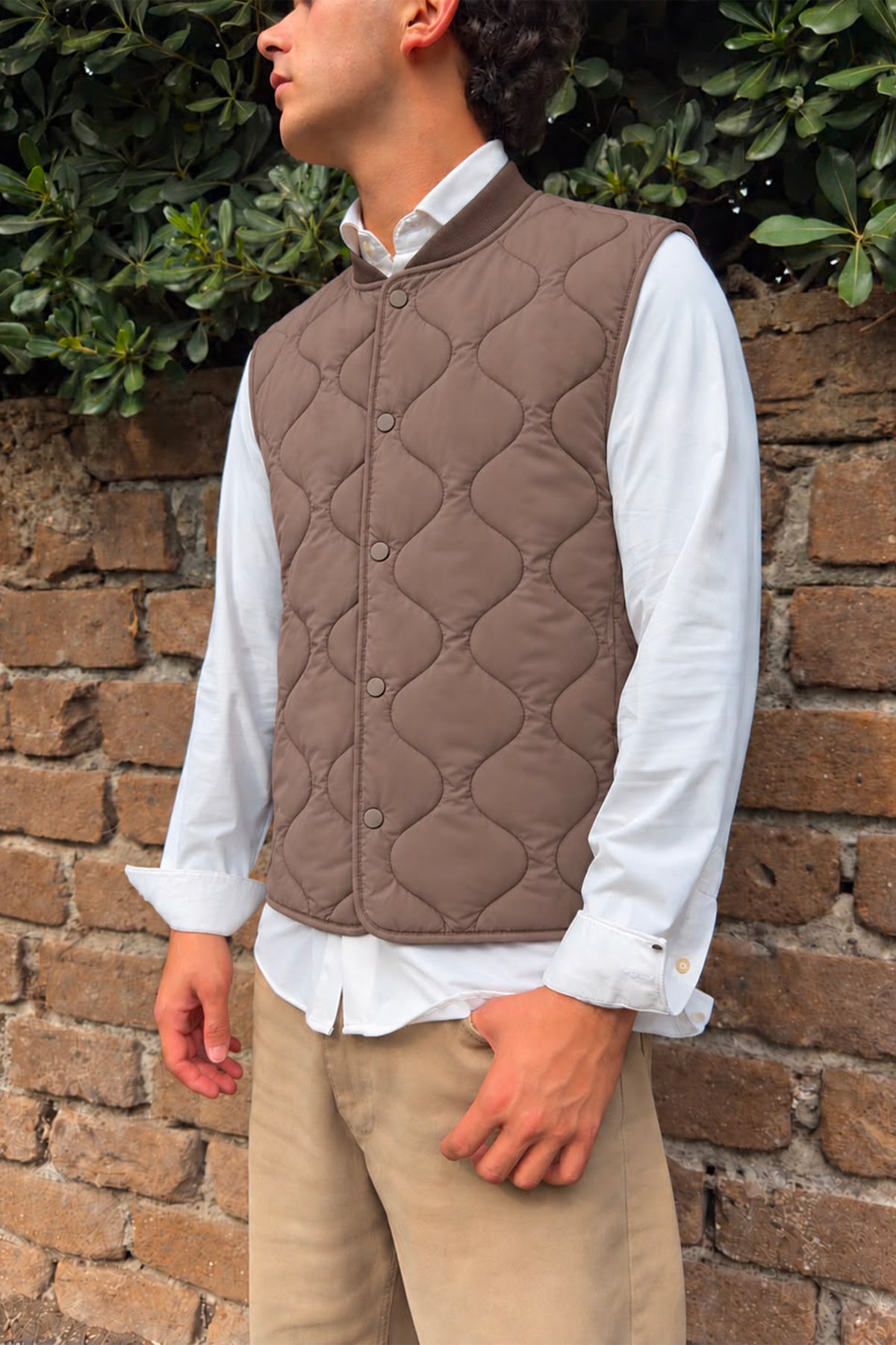 Gilet trapuntato con bottoni