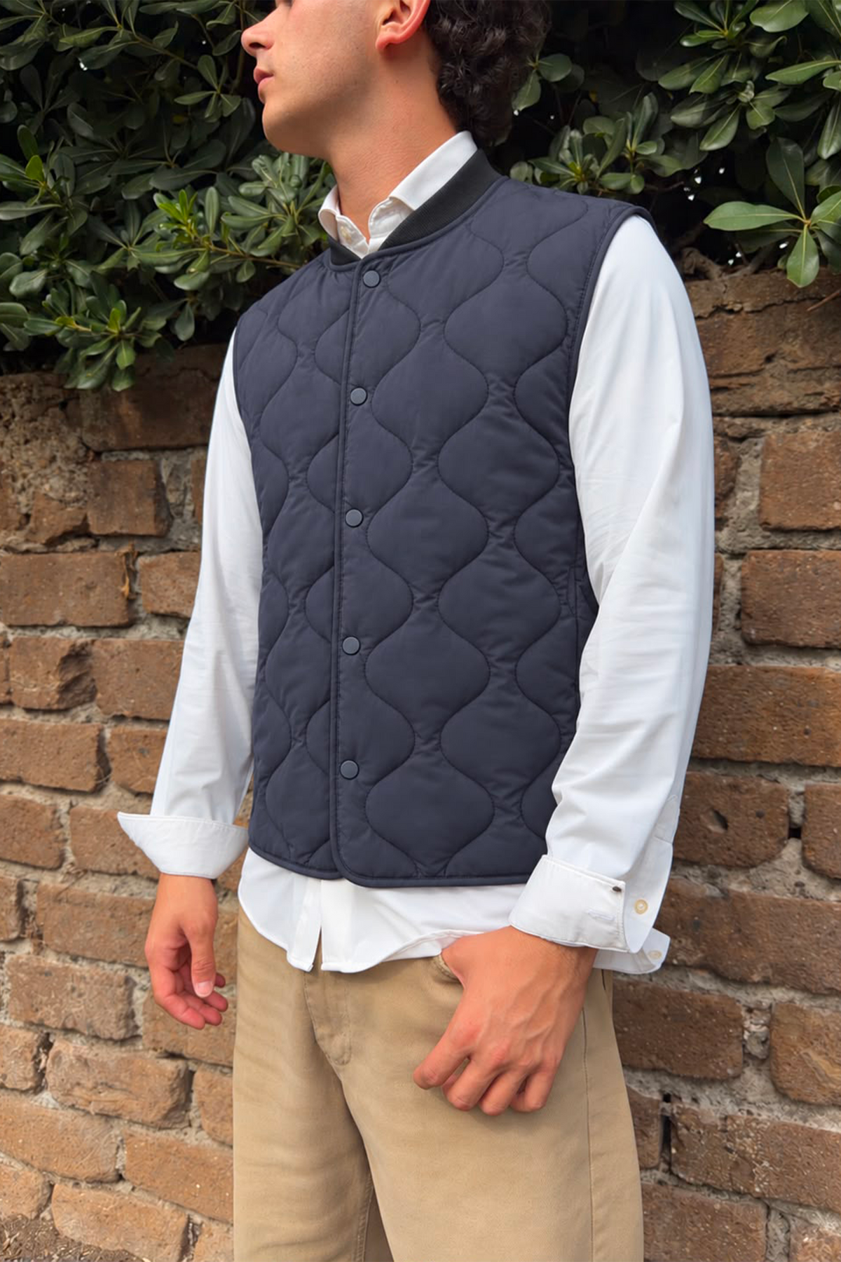 Gilet trapuntato con bottoni