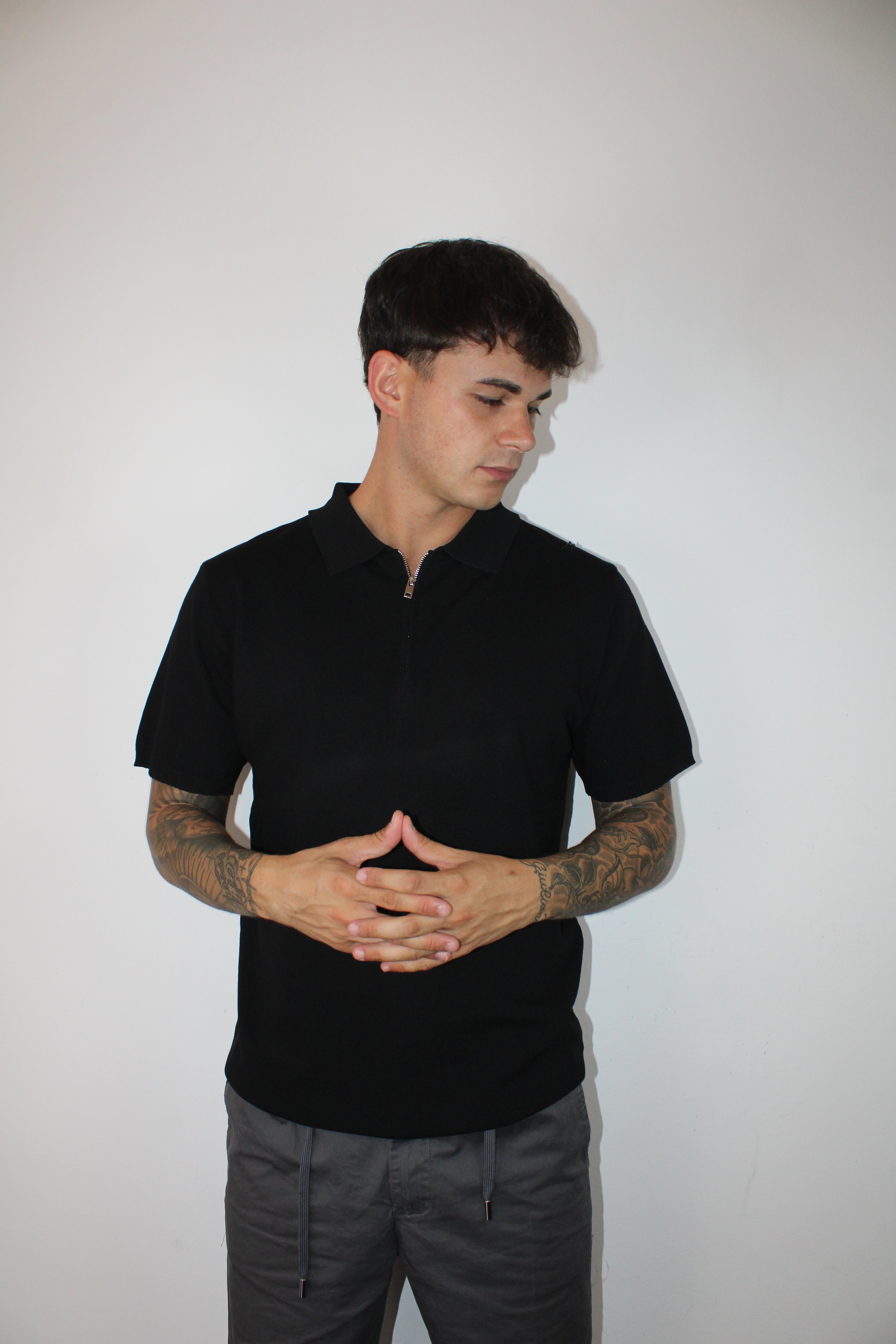 Polo a maniche corte con zip